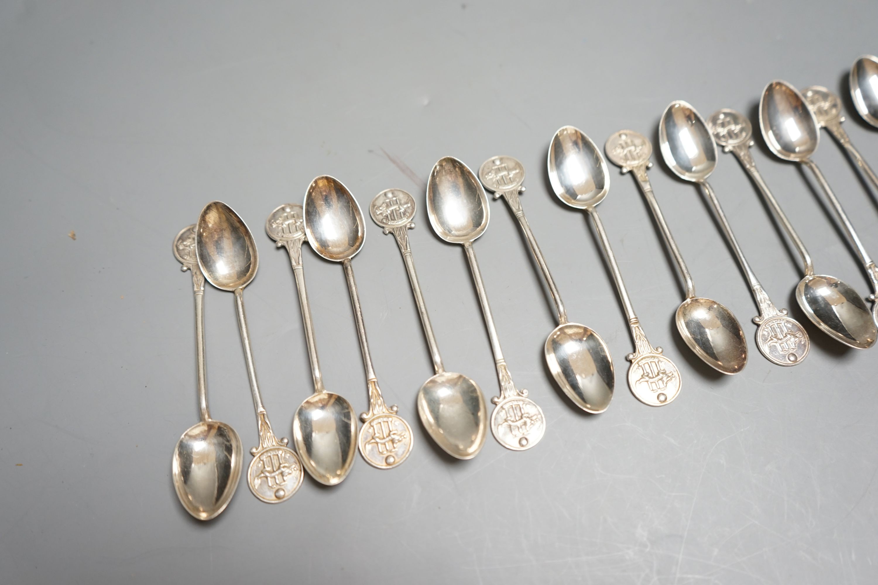 A set of seventeen early 20th century 'Hong Kong Cricket Club' coffee spoons, 10.6cm, 168 grams.